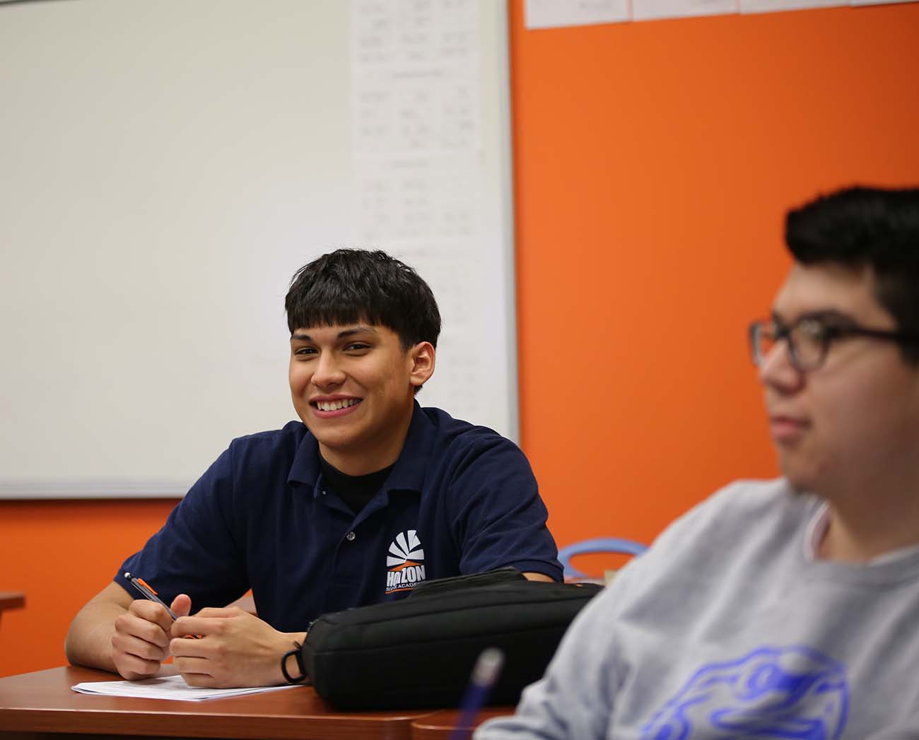 Smiling children together outdoors.